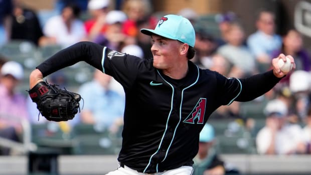 Arizona Diamondbacks left-hander Tommy Henry (32) pitches against the Kansas City Royals at Salt River Fields on March 14, 2024.